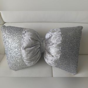 Bow shaped decorative pillows sparkling silver,crushed velvet.